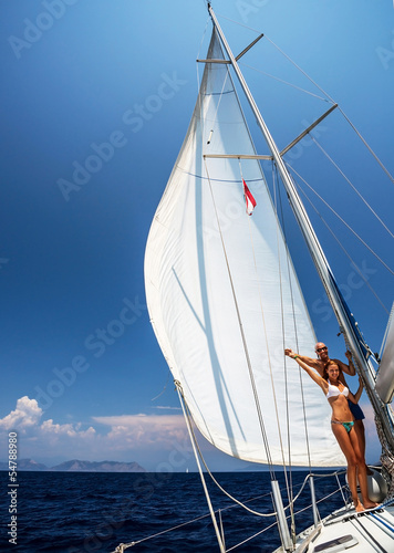 Happy couple on sail boat