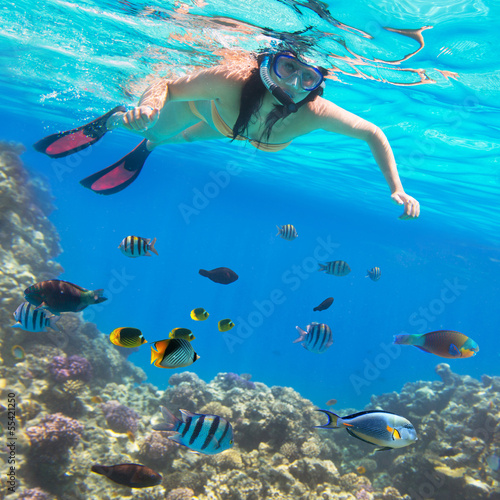 Beautiful woman snorkeling in Red Sea of Egypt