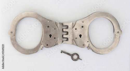 Old handcuffs and key