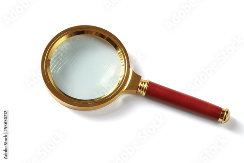 Metal magnifying glass isolated on white background.