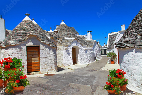 Unique Trulli houses with conical roofs in Alberobello, Italy, P