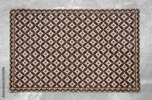 Old traditional romanian wool carpet with ancient motifs