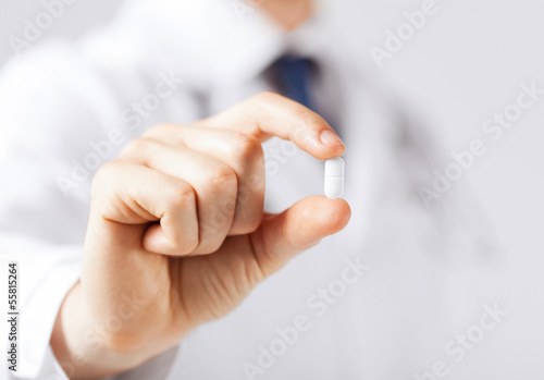 doctor with pill in hospital