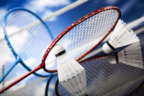 Shuttlecock on badminton racket 