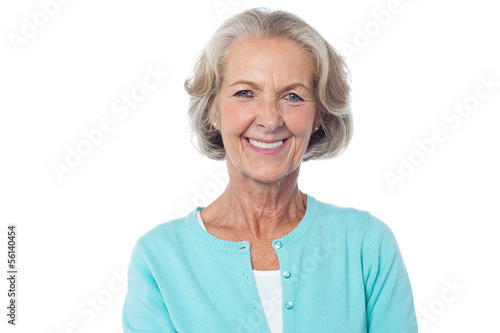 Smiling aged lady in casuals