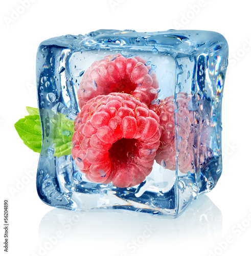 Ice cube and raspberries isolated