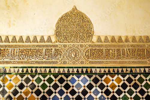 Wall detail of ceramic tile at the Alhambra, Granada, Spain.