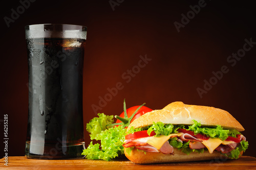 Sandwich, vegetables and cola