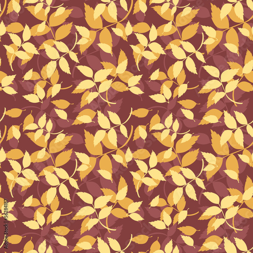 Seamless pattern with autumn leaves on purple. Vector.