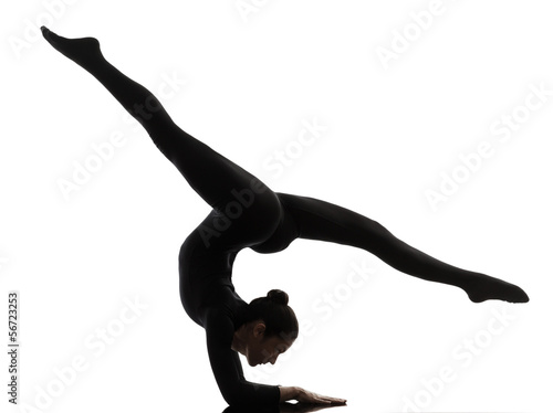 woman contortionist exercising gymnastic yoga silhouette