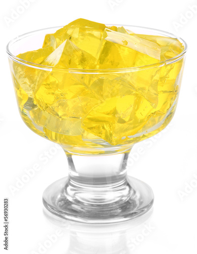 Tasty jelly cubes in bowl isolated on white