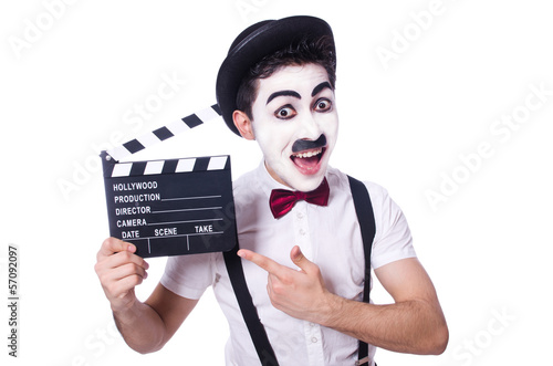 Man with movie clapper isolated on white