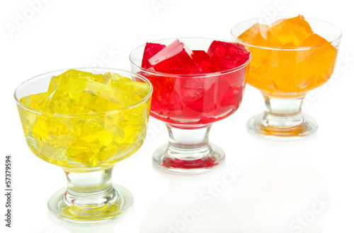 Tasty jelly cubes in bowls isolated on white