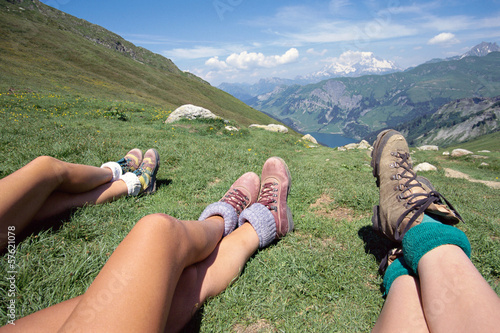 Hikers and mountains landscape on a sunny day in Savoy, France