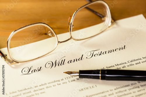 Last will and testament with pen and glasses concept for legal d