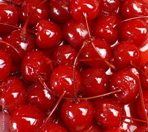 Festive background of red cocktail maraschino cherries