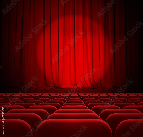 cinema red curtains with spotlight and seats