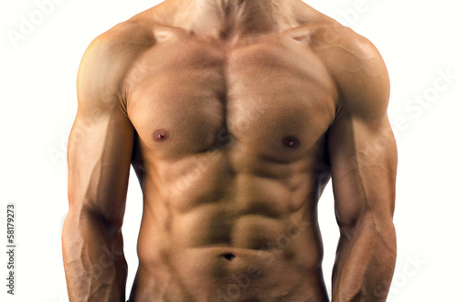 Close up on perfect abs. Strong bodybuilder with six pack