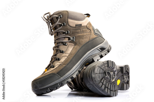A pair of new hiking boots on white background
