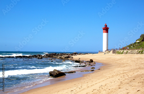 Coastal Seascape With Red and White lighthouse