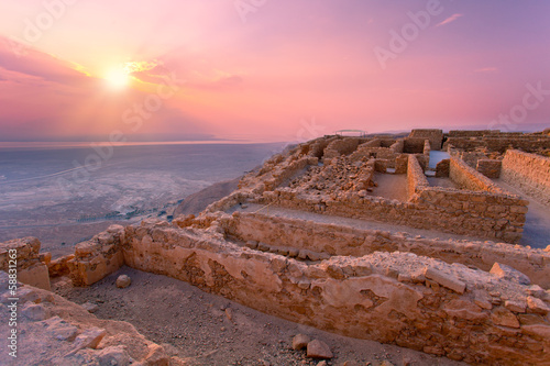 Beautiful sunrise over Masada fortress in Judaean Desert