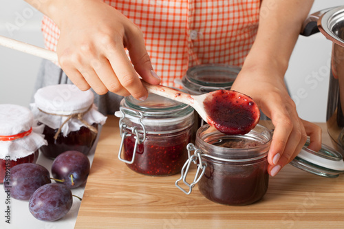 Woman tasting marmalade