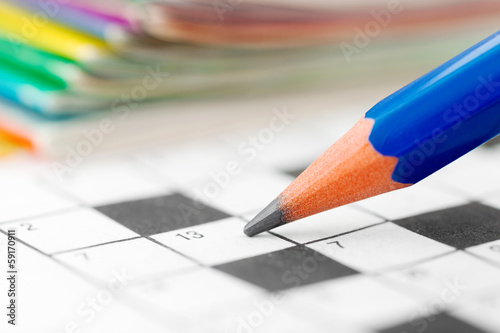 Crossword Puzzle and Pencil