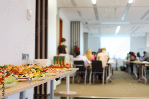 Table with cold snacks and refreshments for business meeting