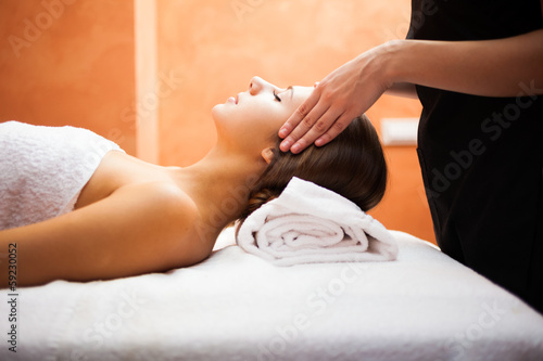 Woman enjoying a facial massage