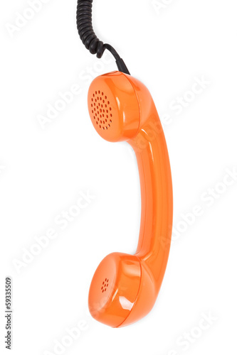 orange telephone receiver over white