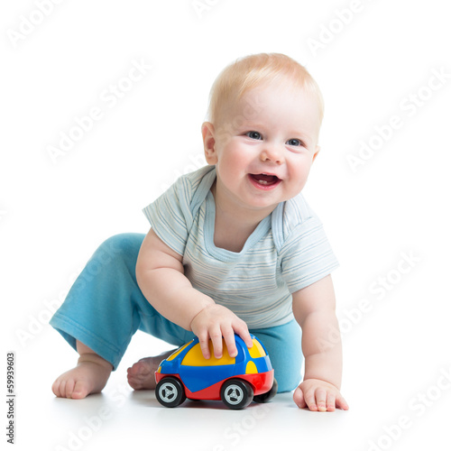 smiling kid playing with toy