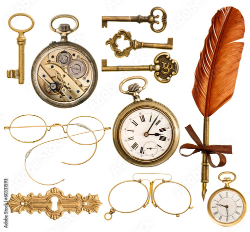 set of golden antique objects. old keys, clock, ink feather pen