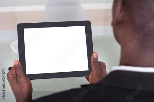 Businessman Holding Digital Tablet