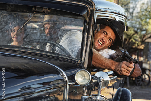 Aggressive Gangster Shooting from Car