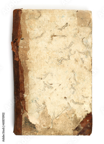 Old book eaten by bookworm on white background