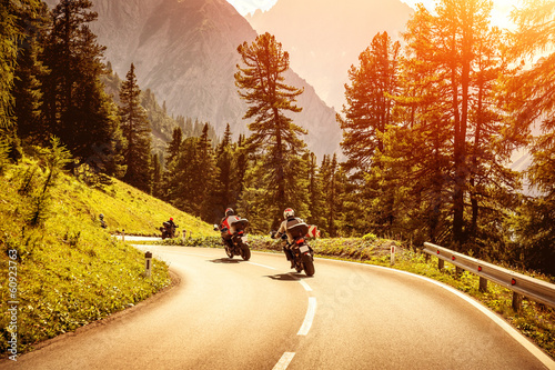Group of motorcyclists on mountainous road