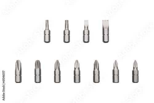 A set of various screwdriver bits isolated on white background