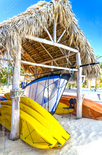 Sailing boats and kayaks on the Caribbean beach in Dominikana