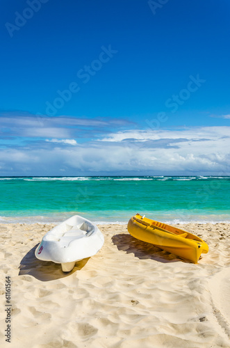 Kayaks on the beautiful sandy Caribbean beach in Dominikana
