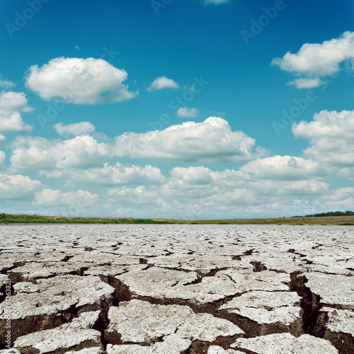 drought earth and dramatic sky with clouds