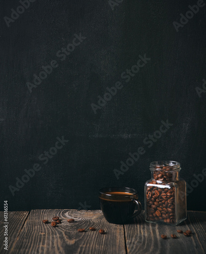 coffee and beans on blackboard background. copy space