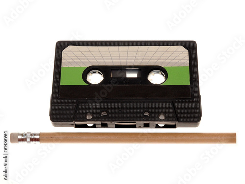 retro music audio tape with a pencil