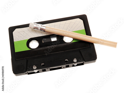 retro music audio tape with a pencil