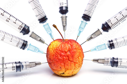 gmo / gmo food / injection of a rotten apple
