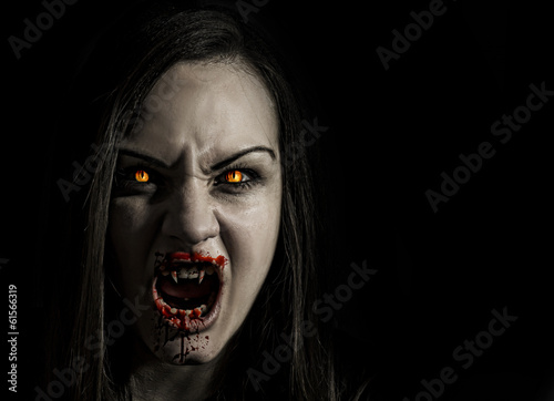 Bloodthirsty female vampire with angry expression