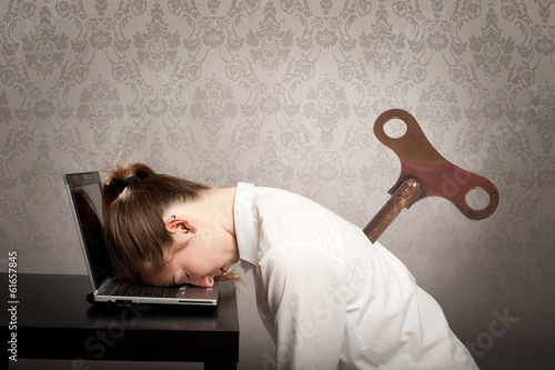 businesswoman sleeping on laptop