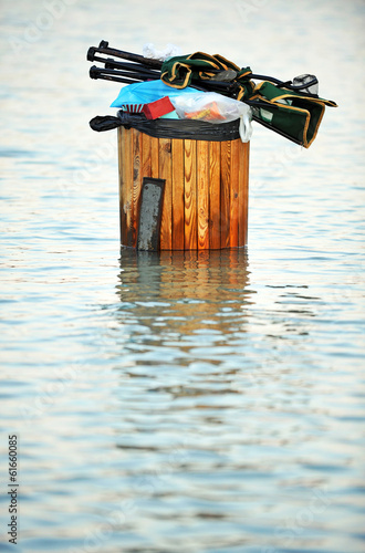 Waste container in the flood, water