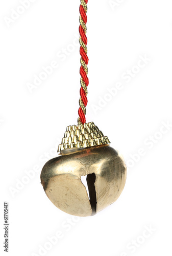 Golden jingle bell on a rope.