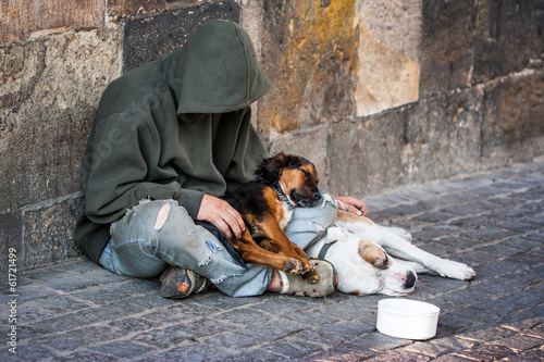 beggar with two Dogs near Charles Bridge, Prague