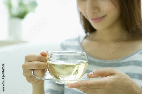 Woman drinking herb tea